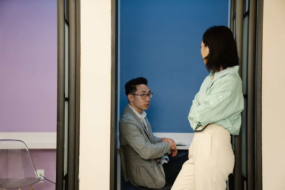 Two colleagues talking in the office